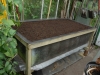 Tank filled with compost